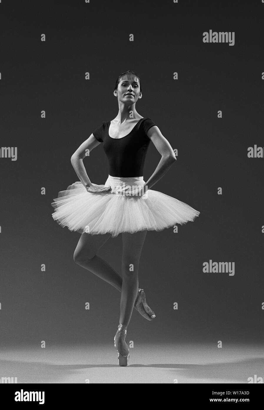 Professional ballerina in various ballet positions and stretches. Stock Photo