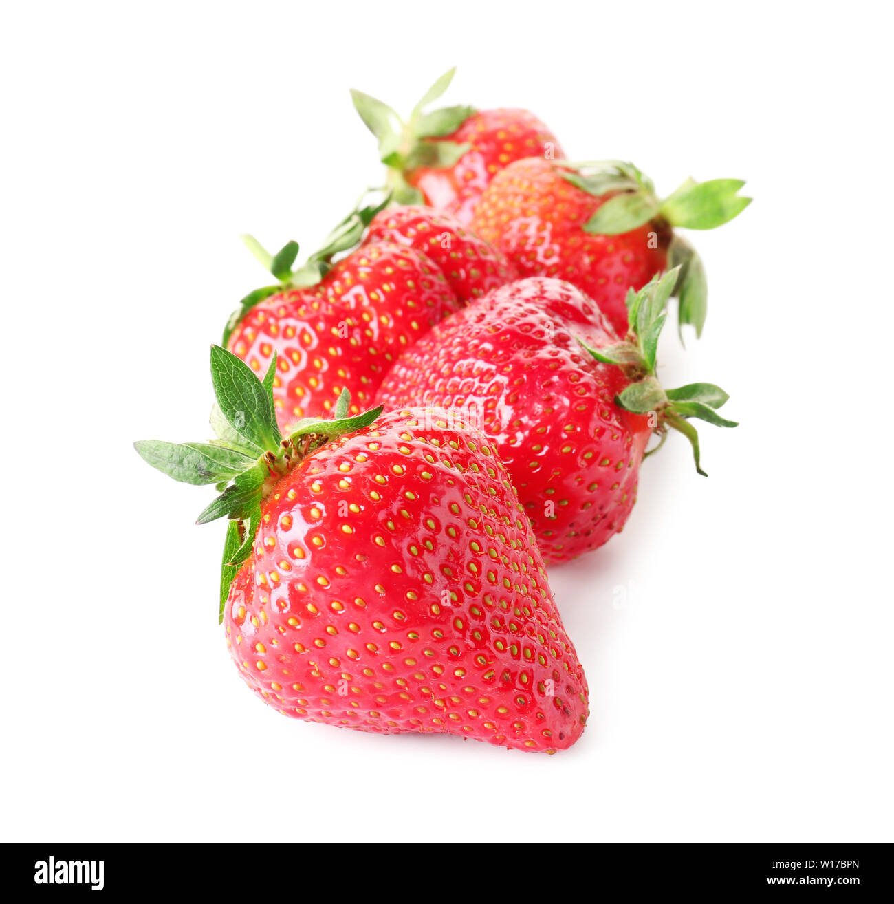Ripe red strawberry on white background Stock Photo - Alamy