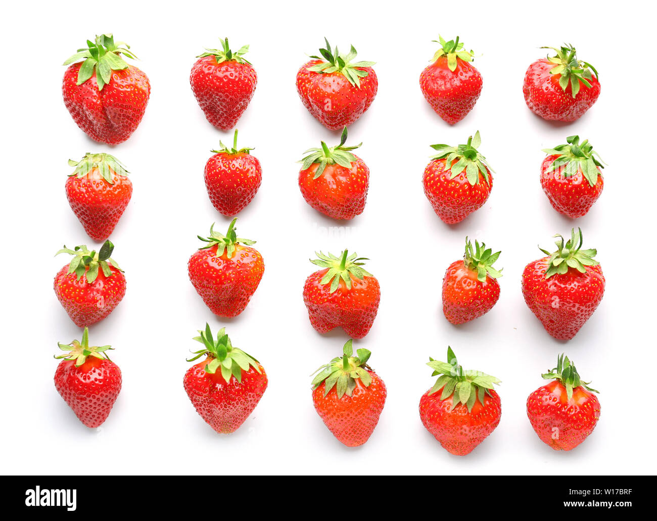 Ripe red strawberry on white background Stock Photo - Alamy