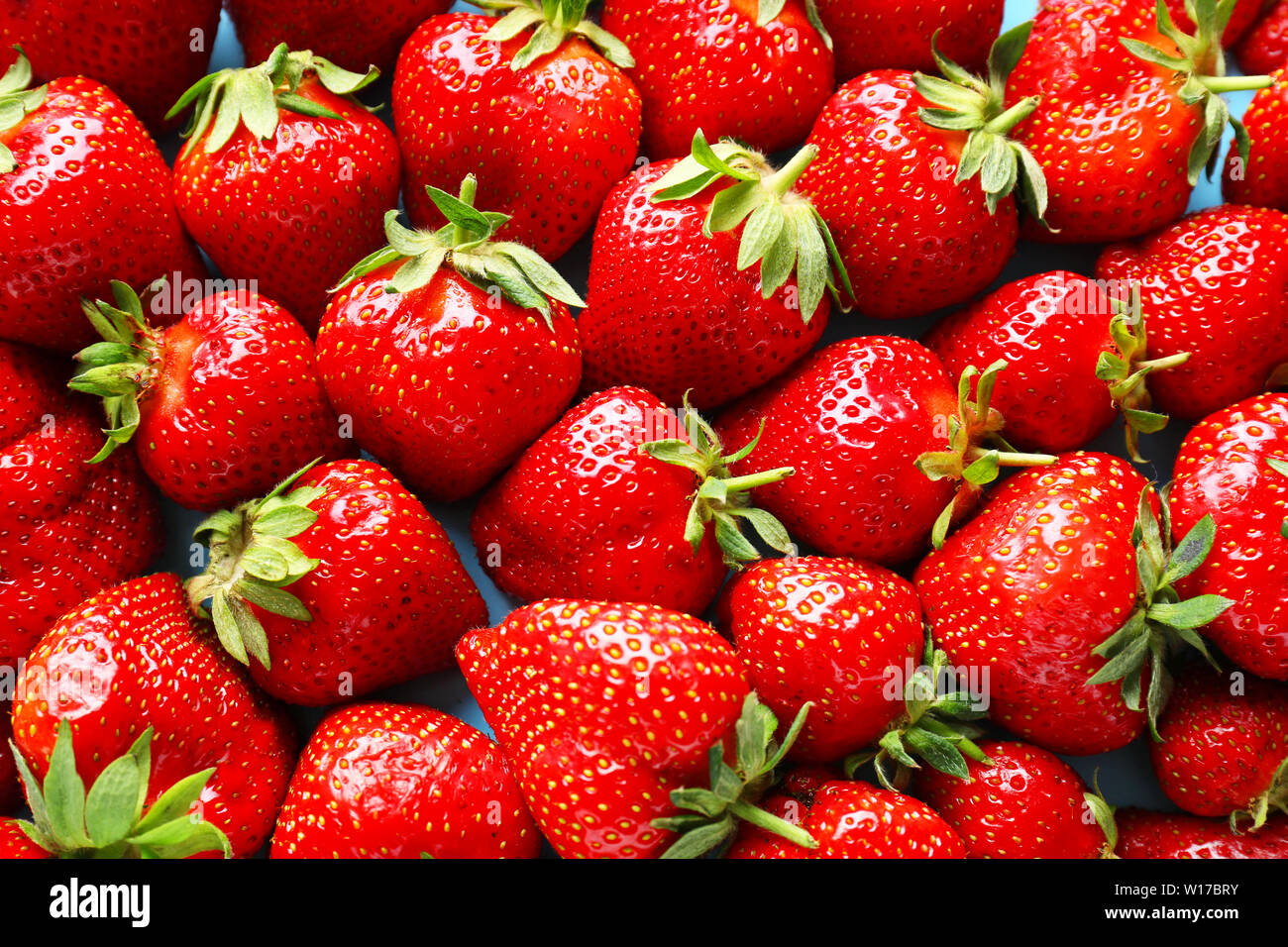 Many ripe red strawberry as background Stock Photo Alamy Many ripe red strawberry as background Stock Photo Alamy