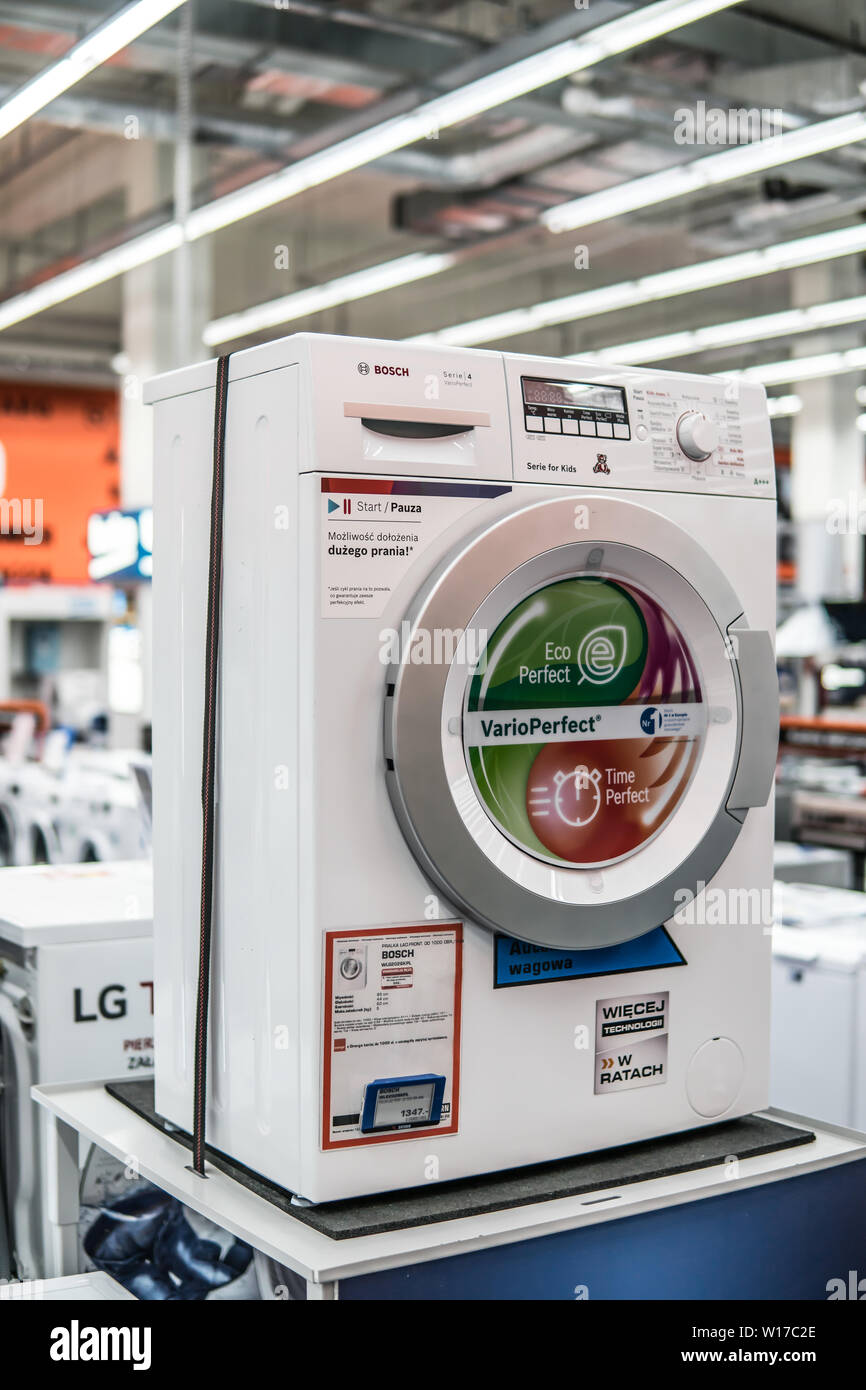 Lodz, Poland, July 2018 inside Saturn electronic store, free-standing Bosch washing machine on display for sale, produced by BSH Home Appliances Stock Photo