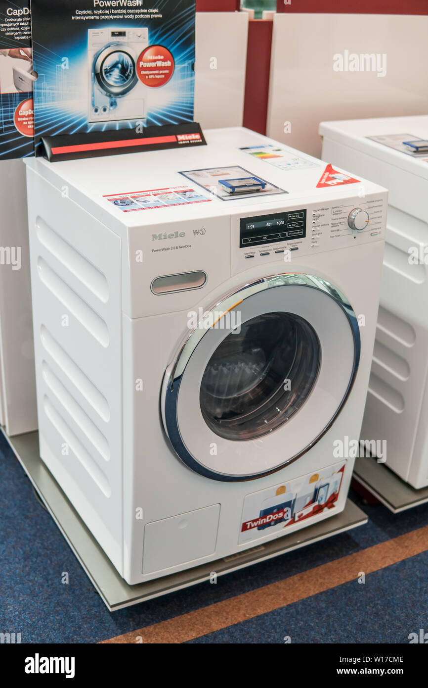 Lodz, Poland, July 2018 inside Saturn electronic store, free-standing Miele  dryer washing machine on display for sale, Miele sign, symbol, logo, brand  Stock Photo - Alamy