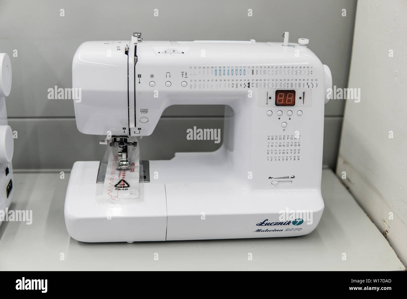 Lodz, Poland, July 9, 2018 inside Saturn electronic store, Sewing Machine  Lucznik on display for sale Stock Photo - Alamy