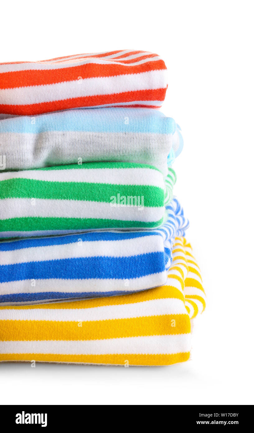 Stack of baby clothes on white background Stock Photo - Alamy
