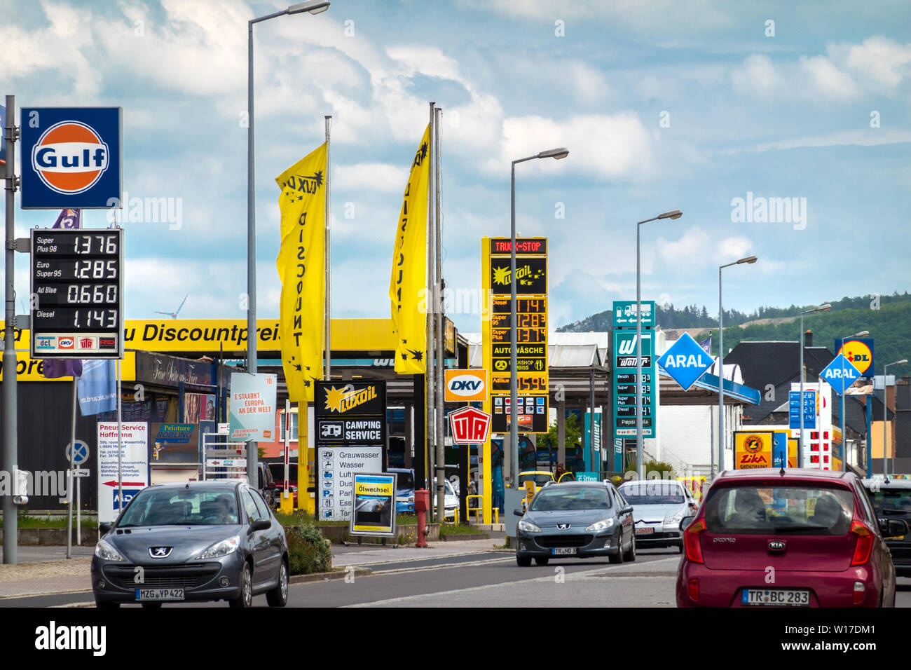 Petrol stations in Wasserbillig Luxembourg Europe where gas fuel diesel prices are lower than in other European countries. German Luxembourg border Stock Photo