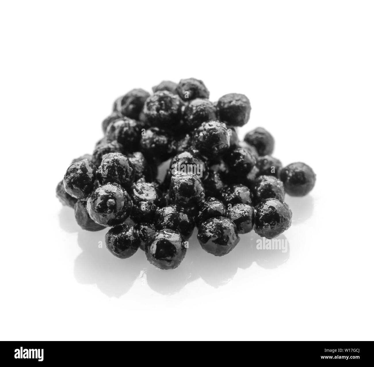 Delicious black caviar on white background Stock Photo Alamy