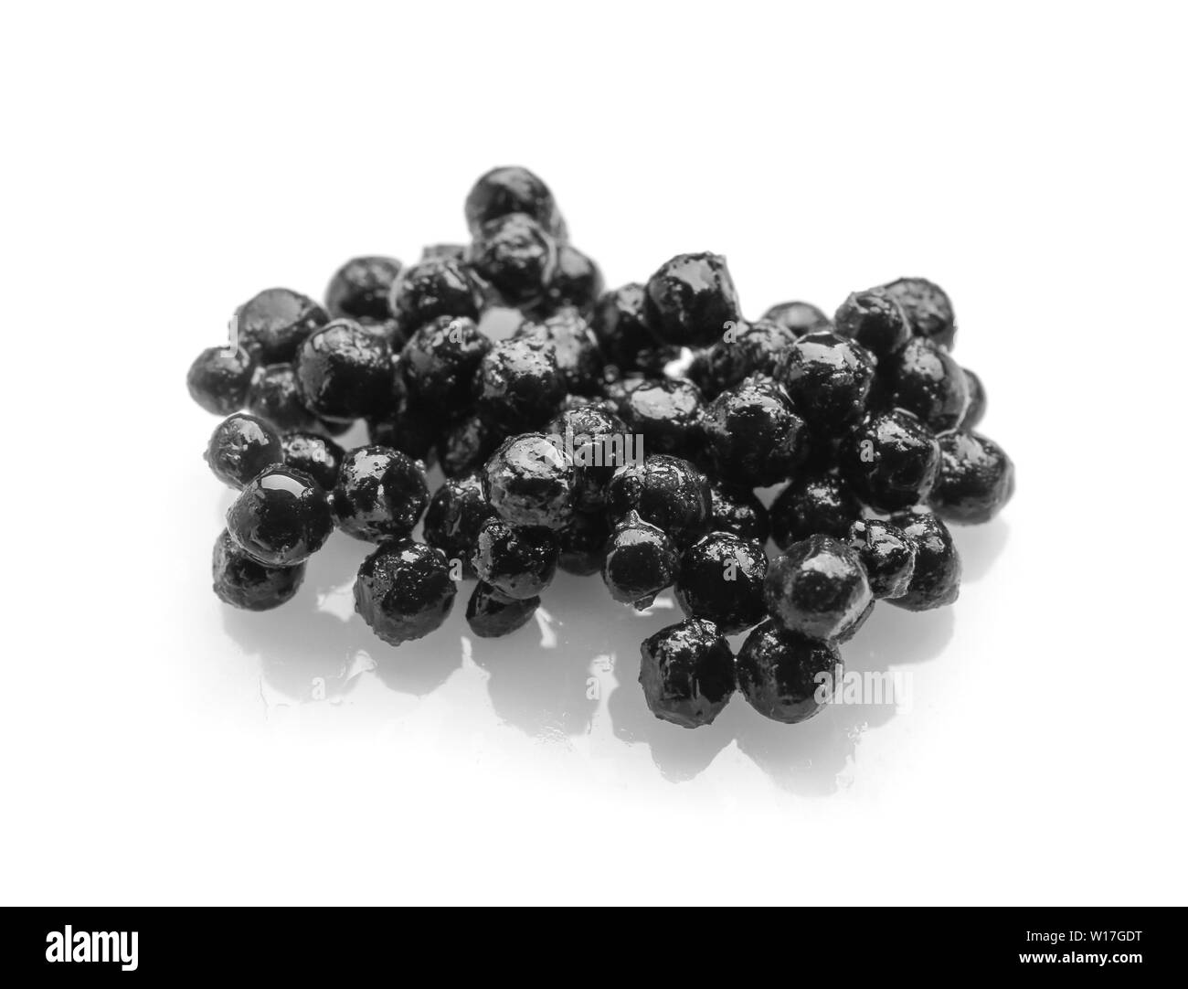 Delicious black caviar on white background Stock Photo Alamy