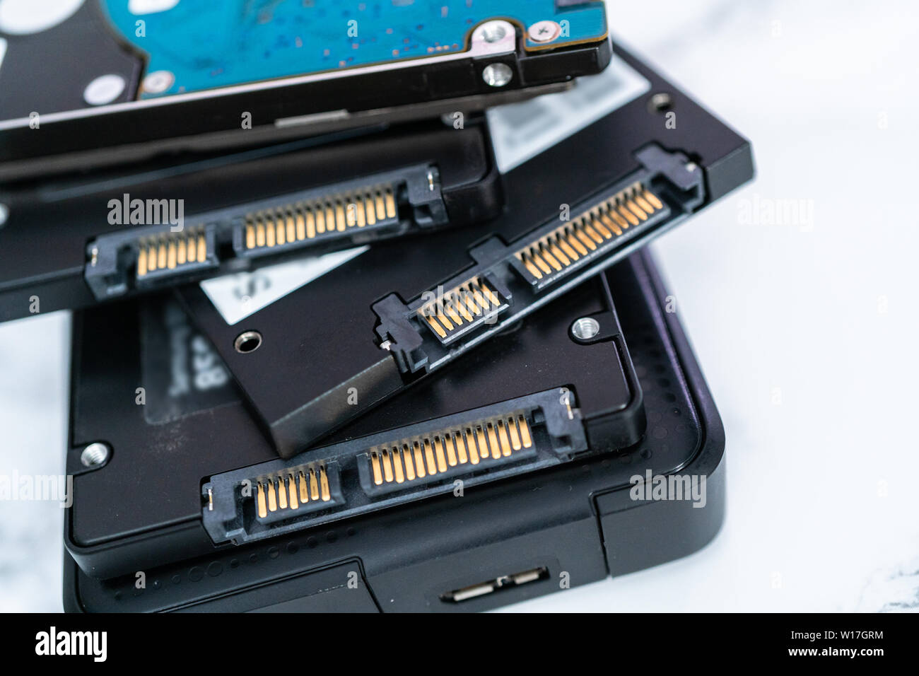 Internal and external solid state hard drives on the table Stock Photo