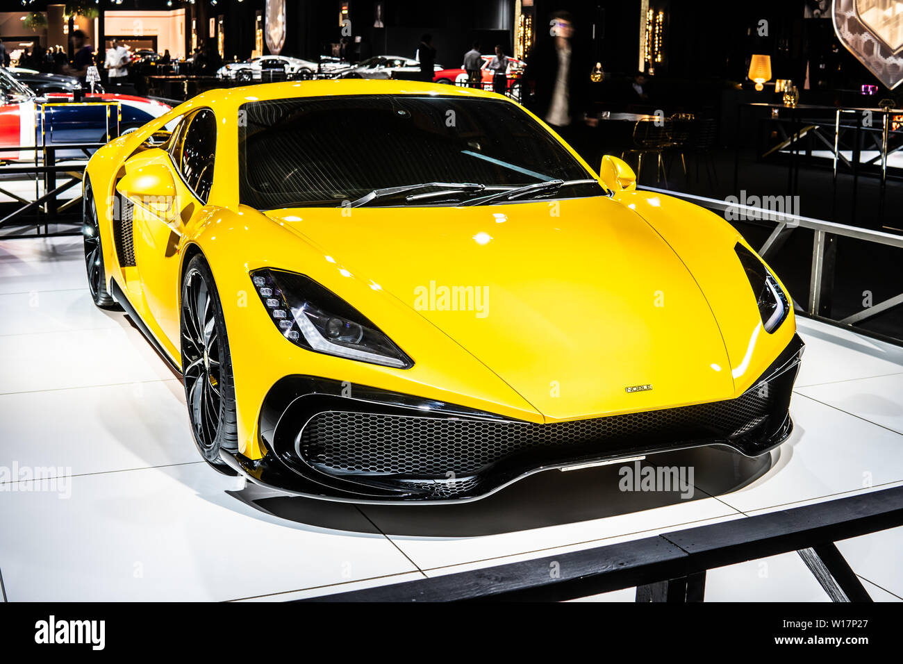 Brussels, Belgium, Jan 18, 2019: metallic yellow Noble M500 British supercar at Brussels Motor Show, produced by Noble Automotive Ltd Stock Photo
