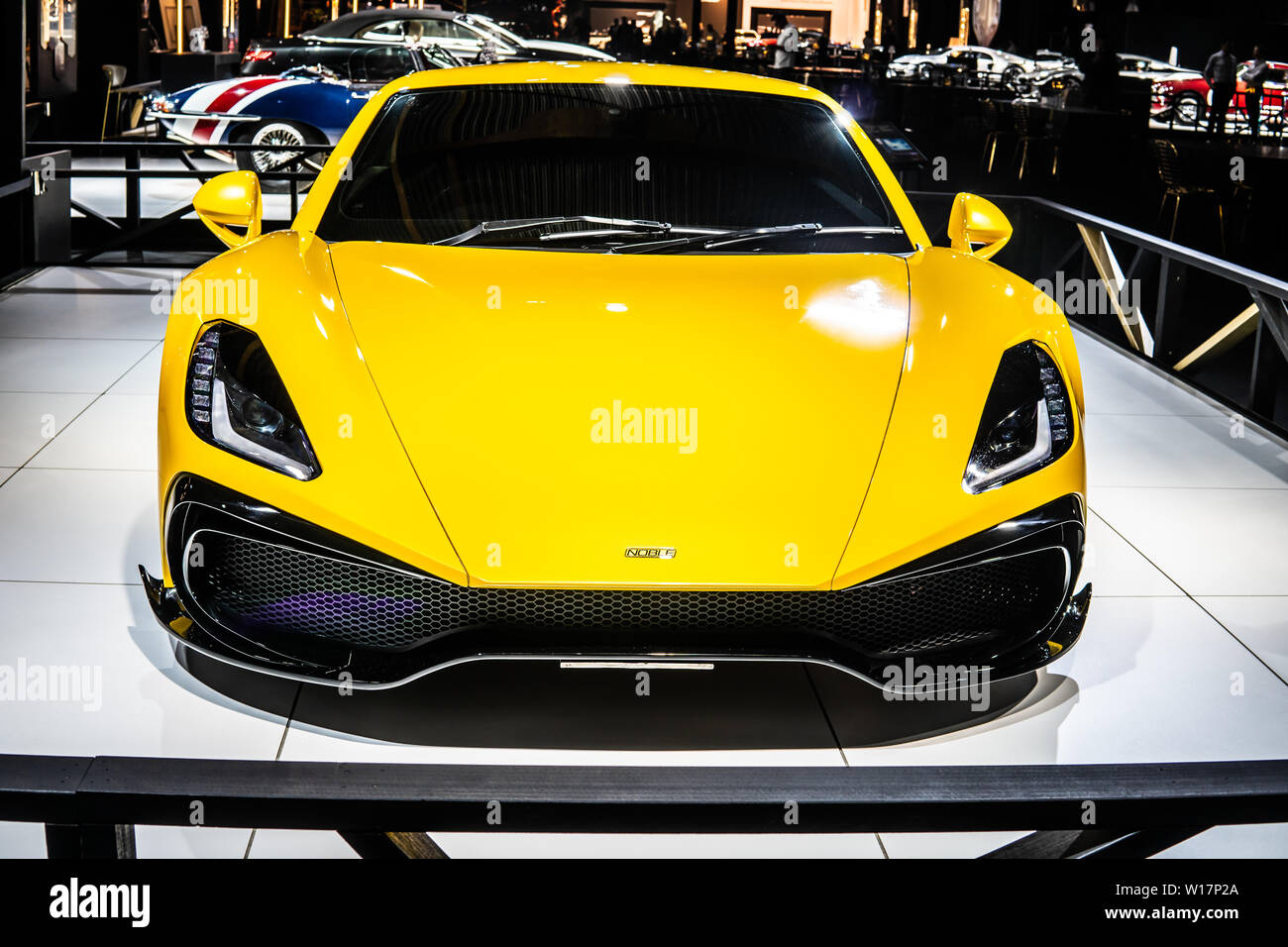 Brussels, Belgium, Jan 18, 2019: metallic yellow Noble M500 British supercar at Brussels Motor Show, produced by Noble Automotive Ltd Stock Photo