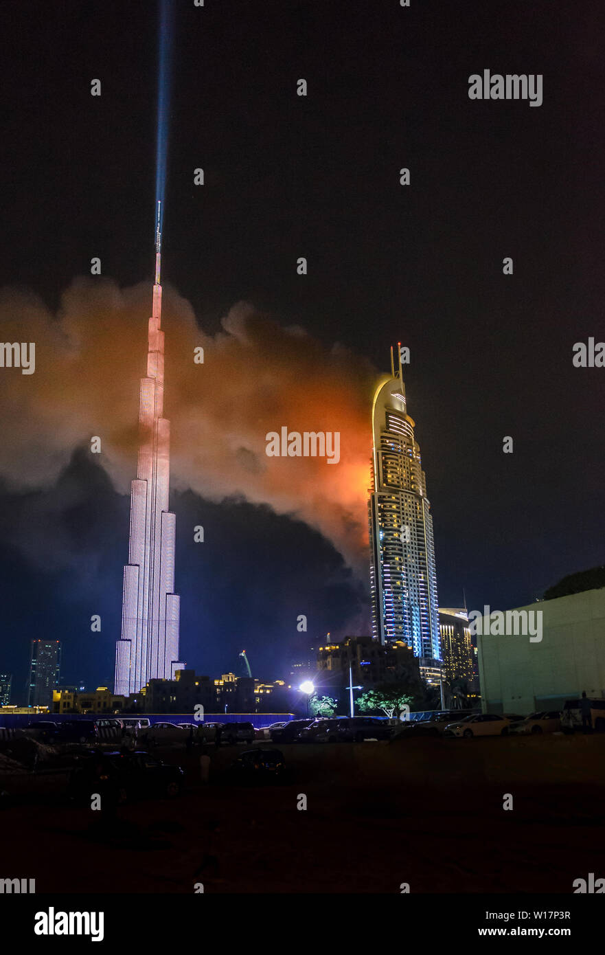 The building seems flames, so lighted as it is. It is one of the most spectacular buildings in the world, being the tallest building (architectural st Stock Photo