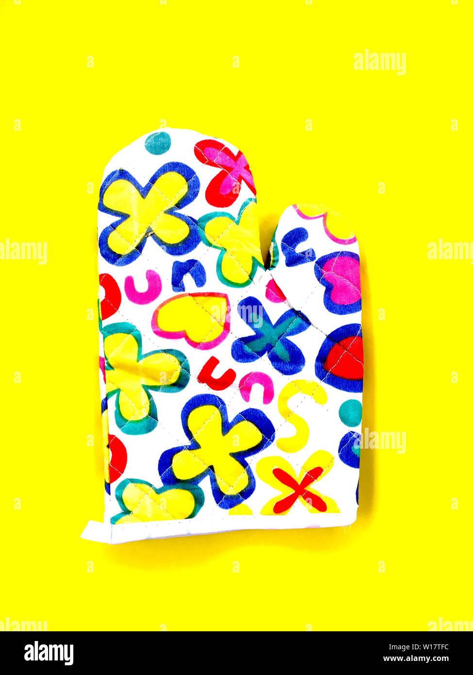 Kitchen Gloves On Yellow Background For Cooking Top View Closeup