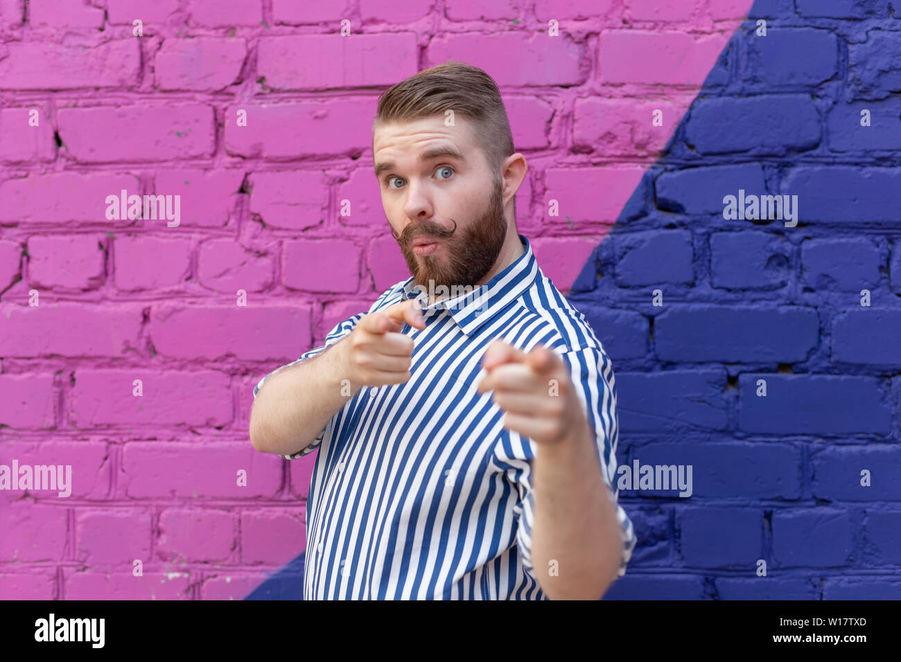 Funny Young Stylish Guy With A Mustache And A Beard In A Stylish