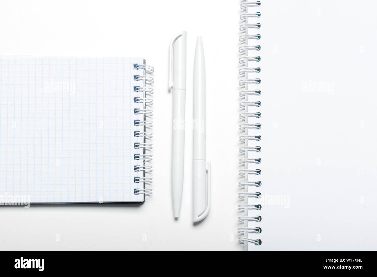 notepad notebook and ball pont pen isolated on white background Stock ...