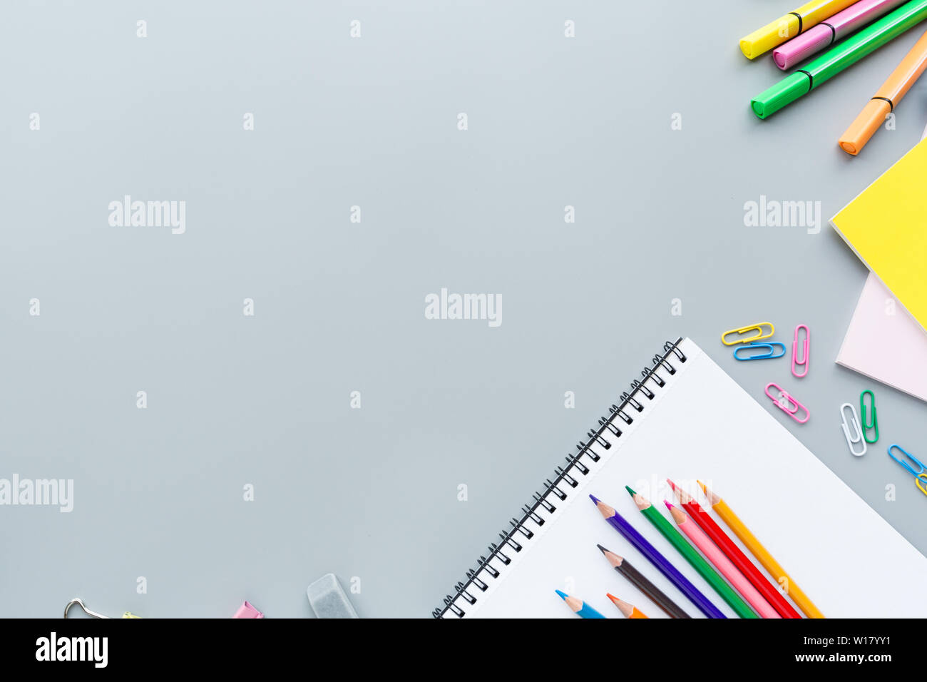 Orange back to school flat lay with bright stationery. School supplies ...