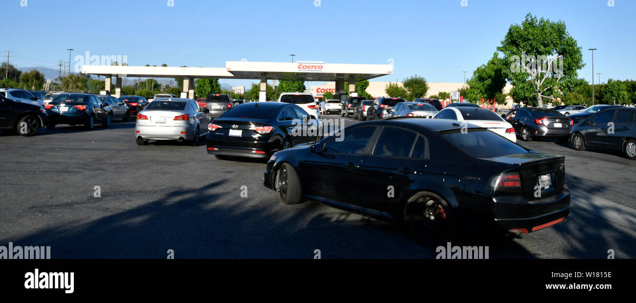 Hundreds of Socal drivers try to save money as they wait up to 45 min in line at a Costco gas station in Van Nuys, CA. Sunday late afternoon June 30, 2019. A new 6-cents-per-gallon gas tax takes effect statewide on July 1. That brings the total gas tax in California to 61.8 cents a gallon, the highest in the nation.The increase is part of SB 1, legislation that was signed into law in 2017.The measure is expected to bring in some $54 billion in state revenue over the next decade, funds that are supposed to pay for road and bridge repair.Photo by Gene Blevins/ZumaPress (Credit Image: © Gen Stock Photo