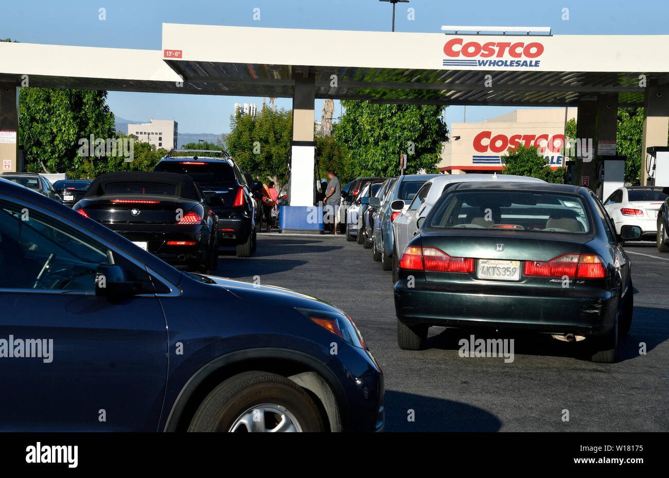 Hundreds of Socal drivers try to save money as they wait up to 45 min in line at a Costco gas station in Van Nuys, CA. Sunday late afternoon June 30, 2019. A new 6-cents-per-gallon gas tax takes effect statewide on July 1. That brings the total gas tax in California to 61.8 cents a gallon, the highest in the nation.The increase is part of SB 1, legislation that was signed into law in 2017.The measure is expected to bring in some $54 billion in state revenue over the next decade, funds that are supposed to pay for road and bridge repair.Photo by Gene Blevins/ZumaPress (Credit Image: © Gen Stock Photo