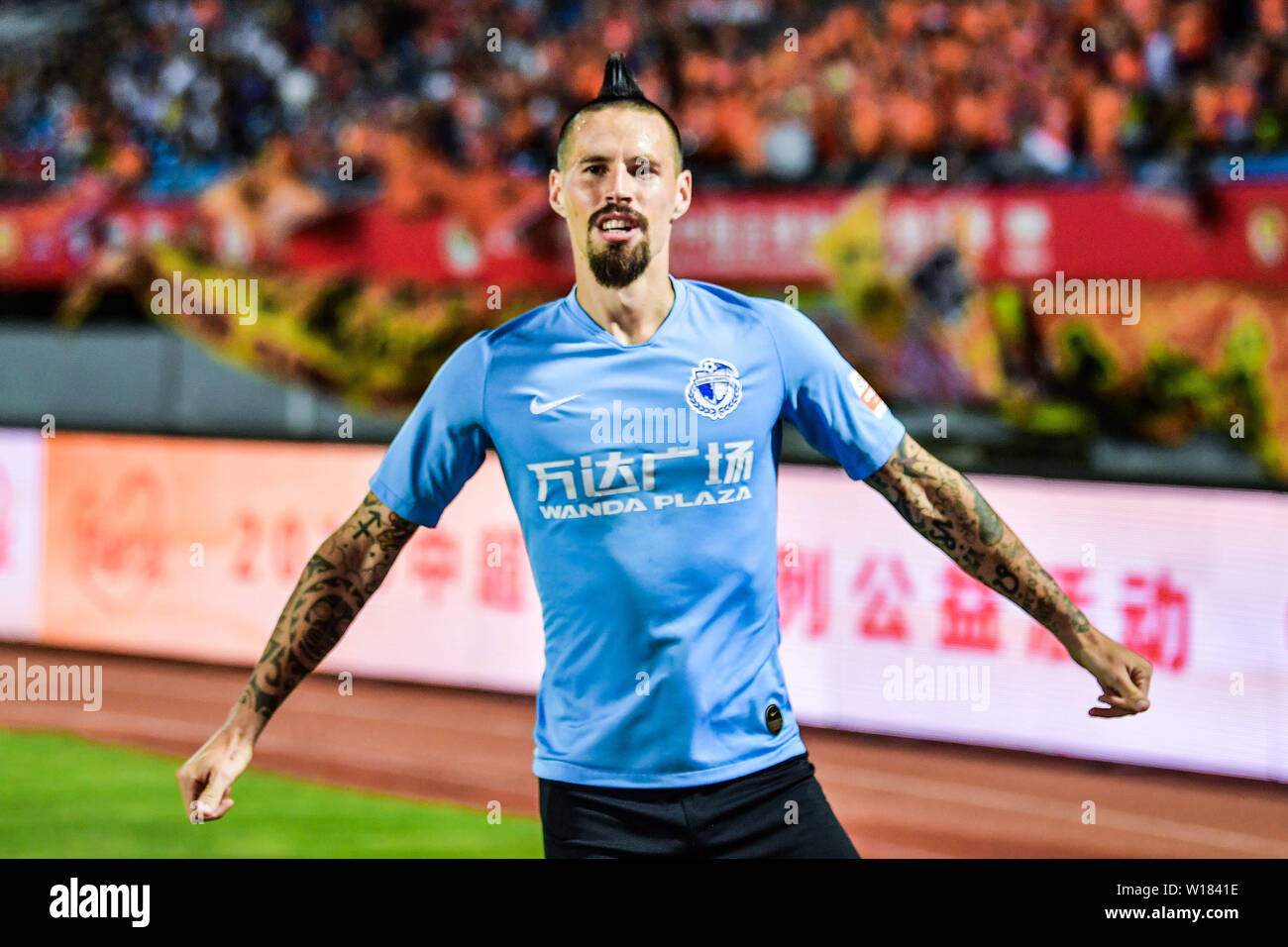 Slovak Football Player Marek Hamsik Of Dalian Yifang Celebrates After Scoring Against Beijing Renhe In Their