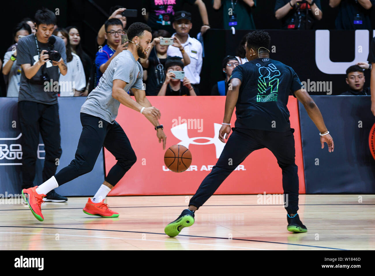 NBA stars Stephen Curry, left, of Golden State Warriors, and Dennis Smith  Jr. of New York Knicks, attend the 2019 Under Armour Basketball Asia Tour  in Shanghai, China, 29 June 2019 Stock Photo - Alamy