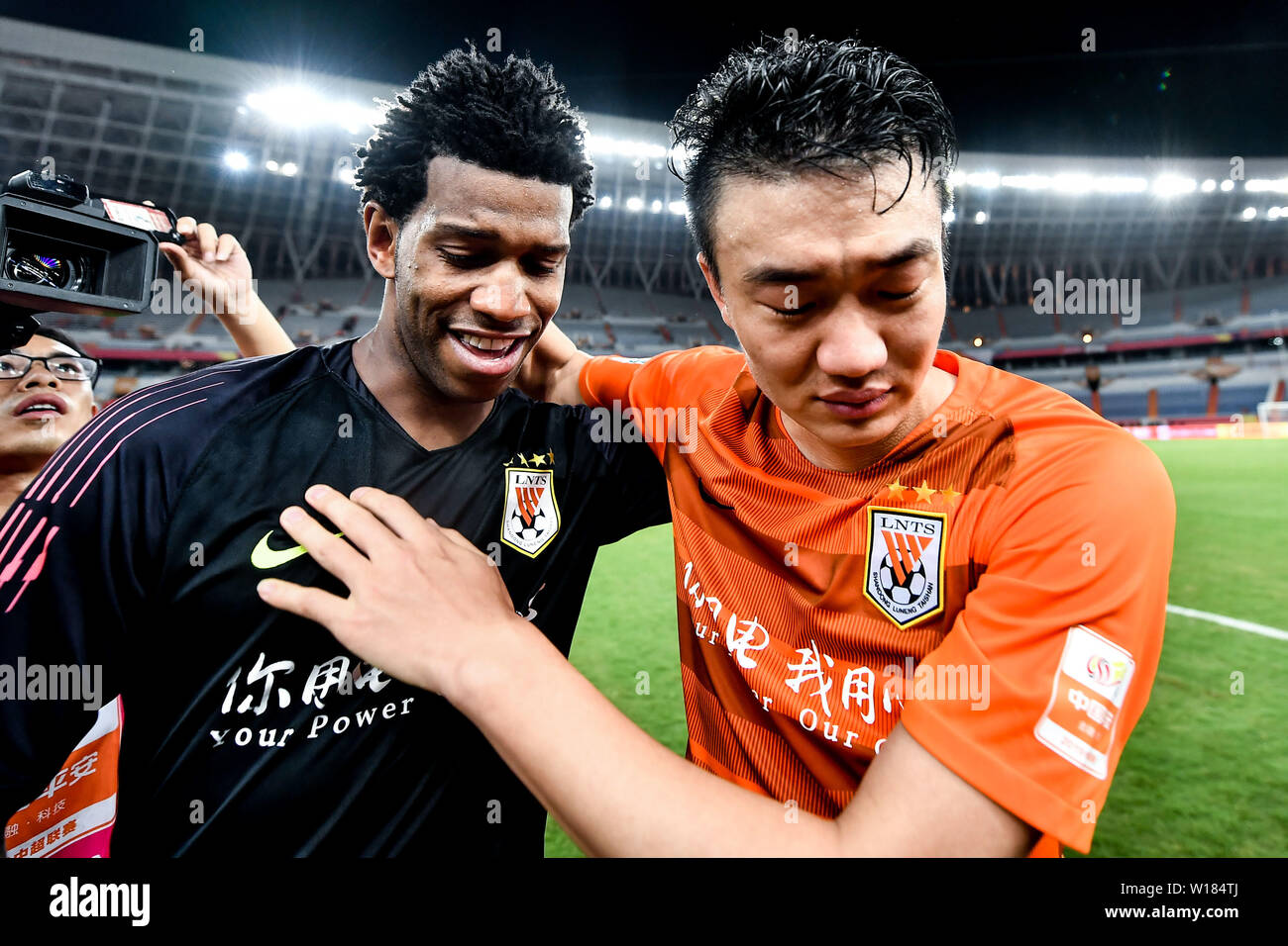 Brazilian football player Carlos Gilberto Nascimento Silva or simply Gil, of Shandong Luneng Taishan poses after their 15th round match against Beijing Sinobo Guoan during the 2019 Chinese Football Association Super League (CSL) in Ji'nan city, east China's Shandong province, 30 June 2019. Stock Photo