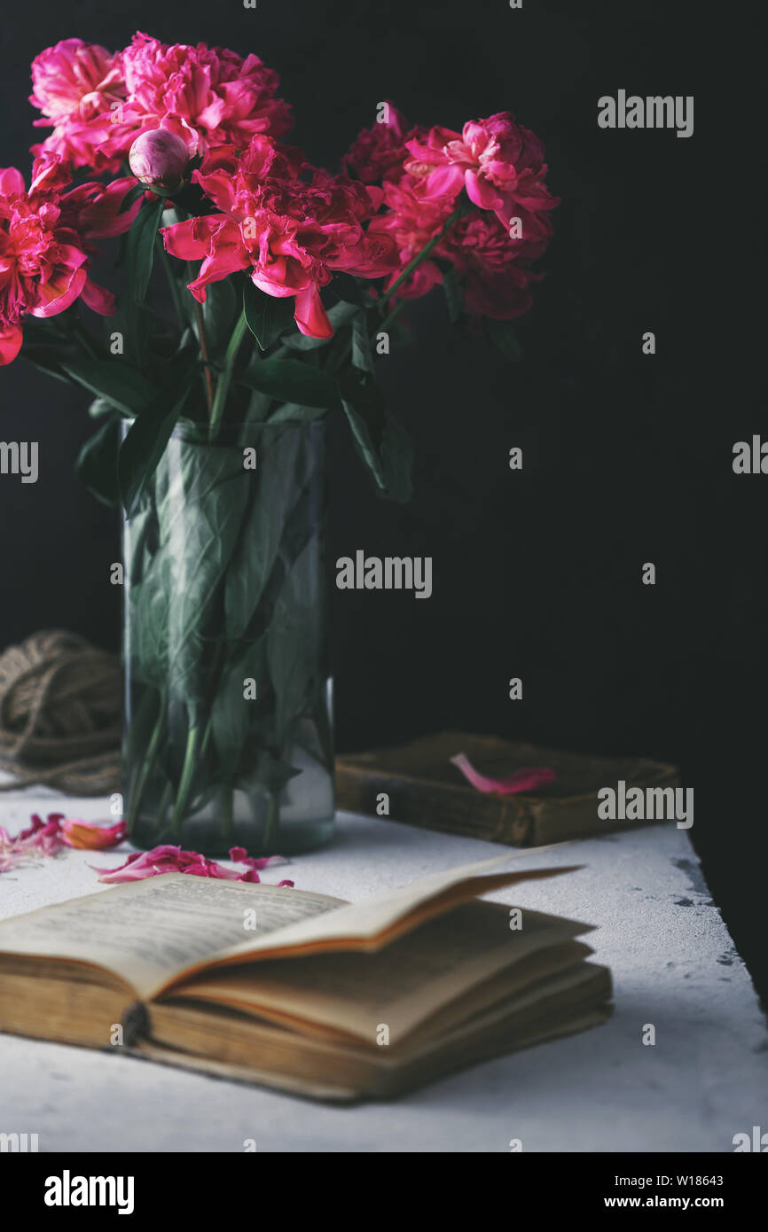 Still life with flowers peonies in vase on a dark background Stock ...