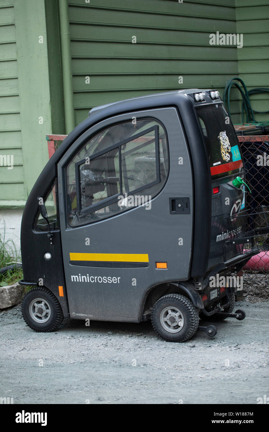 The Mini Crosser Cabin, an enclosed electric mobility scooter, made in  Denmark Stock Photo - Alamy