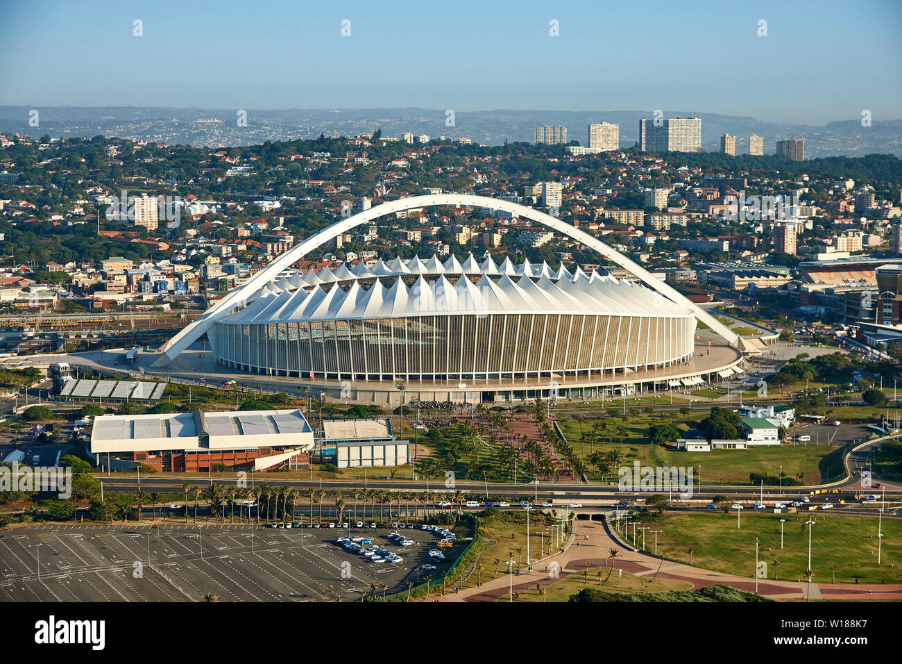 Drone aerial view of Moses Mabhida Stadium and city of Durban. Kwazulu Natal, South Africa. Full colour horizontal image. Stock Photo