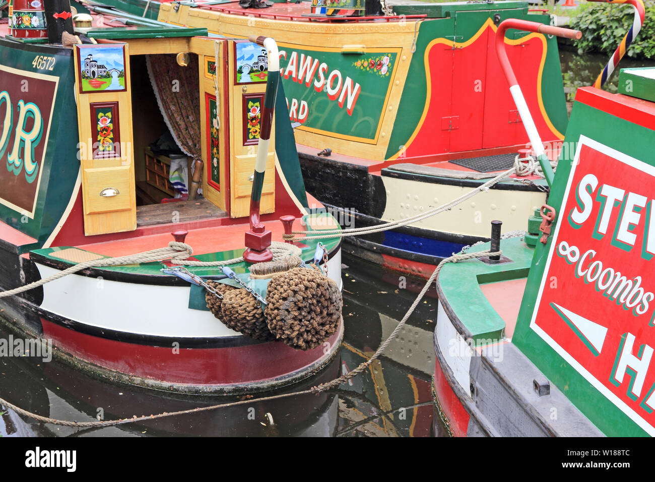 Colourful former working Narrowboats moored on Rochdale Canal, Hebden Bridge Stock Photo