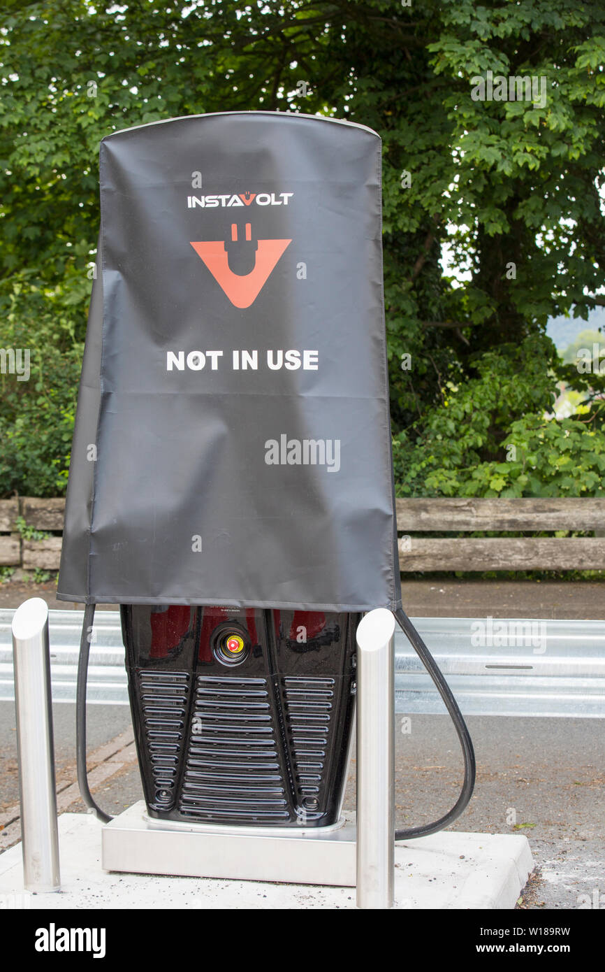 Electric vehicle charging points being installed in the car park of