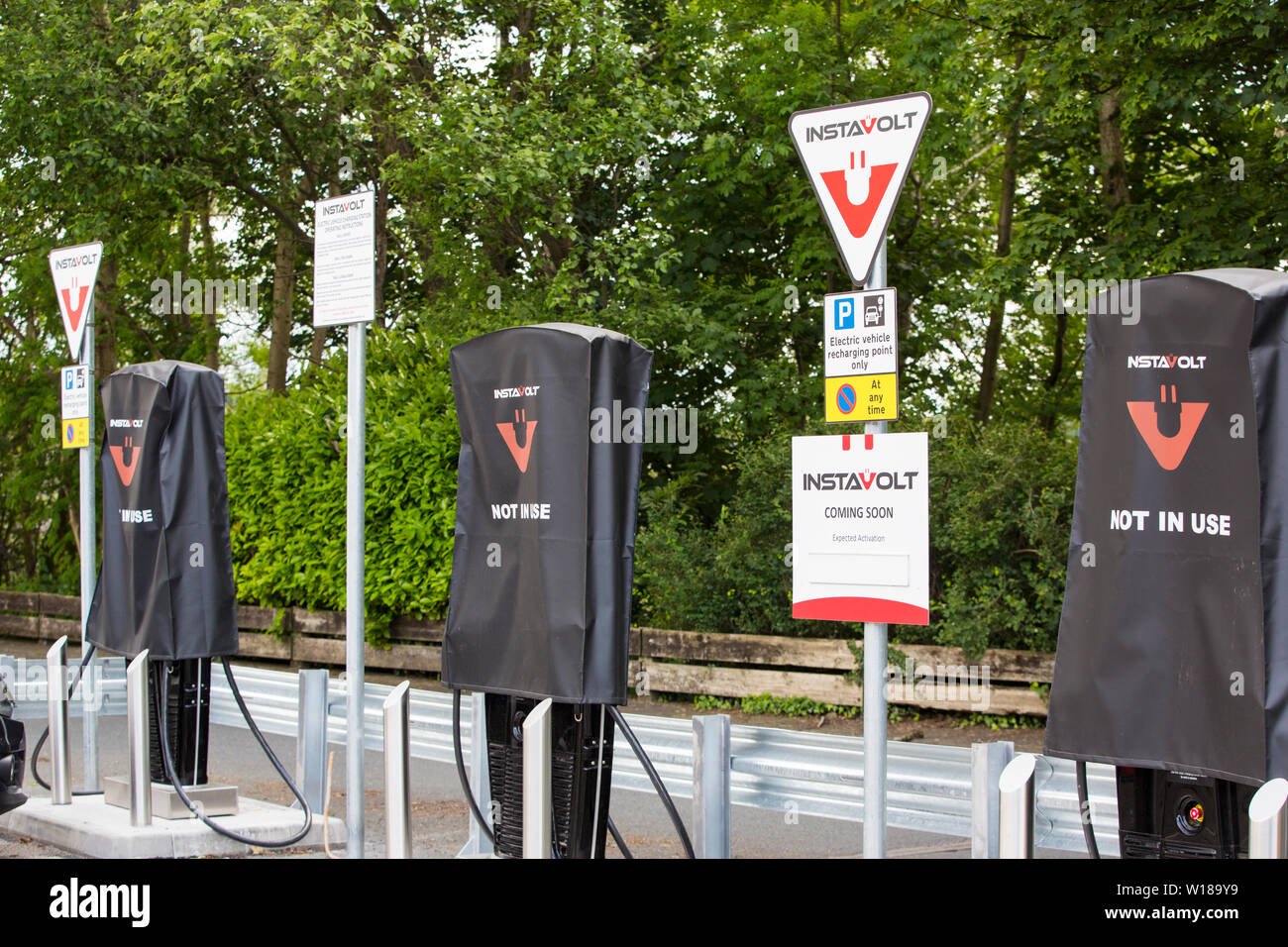 Electric vehicle charging points being installed in the car park of