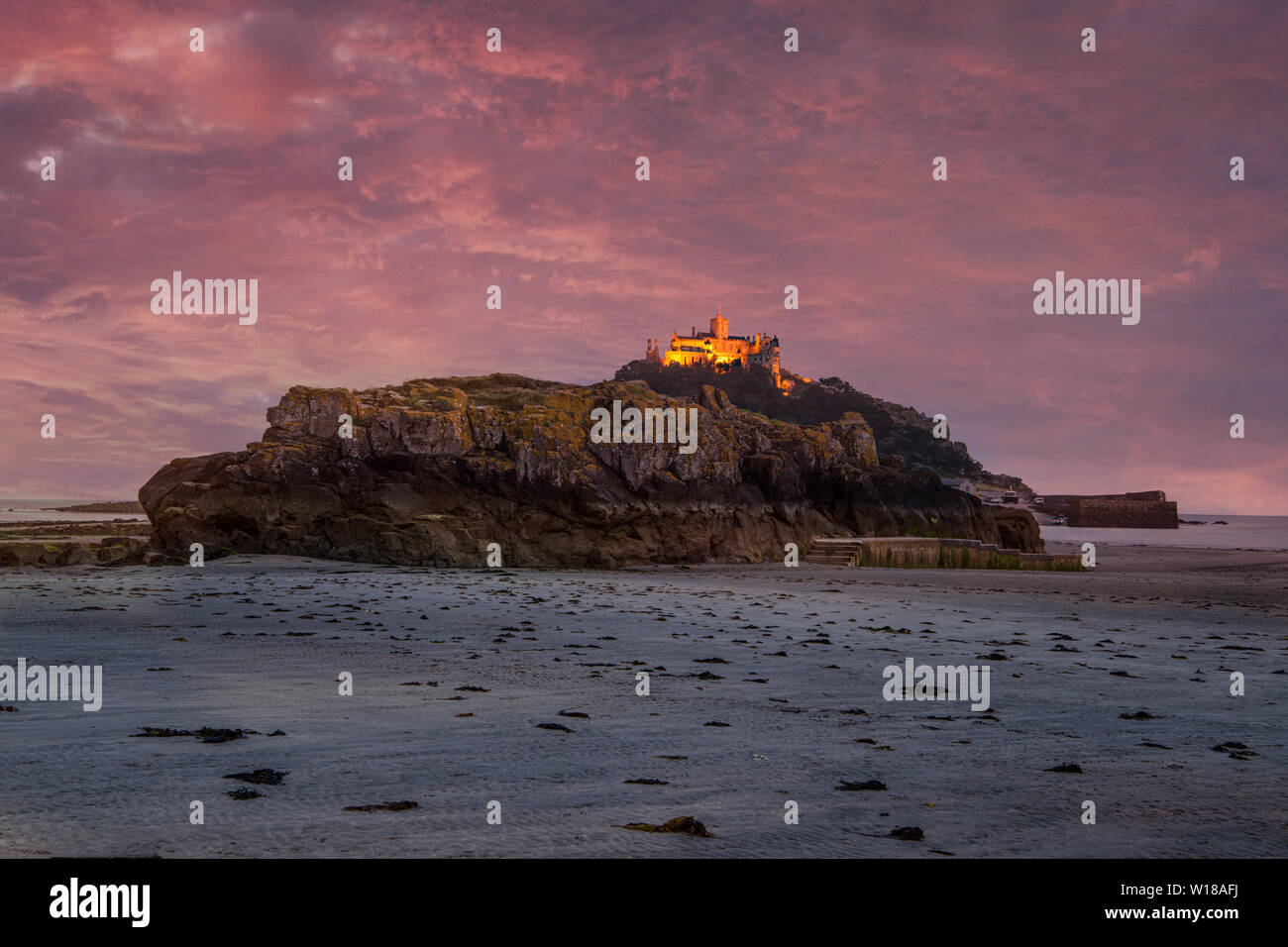 st. michael's mount with the castle and church Cornwall at sunset Stock Photo