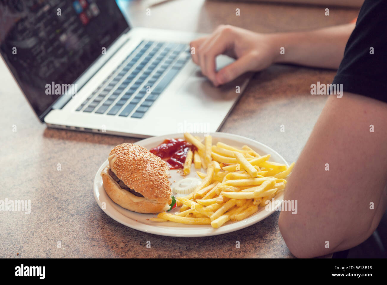 Laptop with lunch, break fast Stock Photo