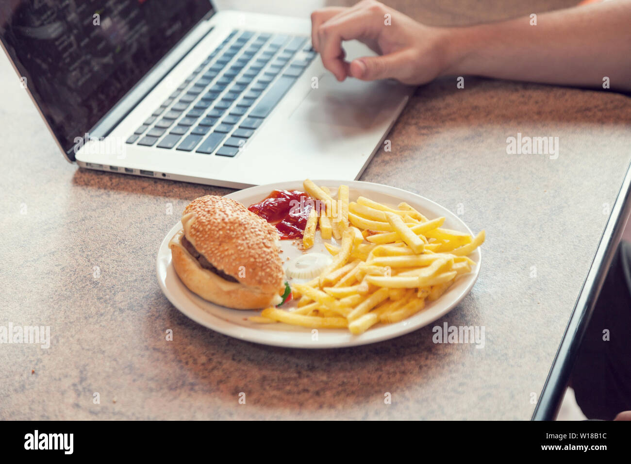 Laptop with lunch, break fast Stock Photo
