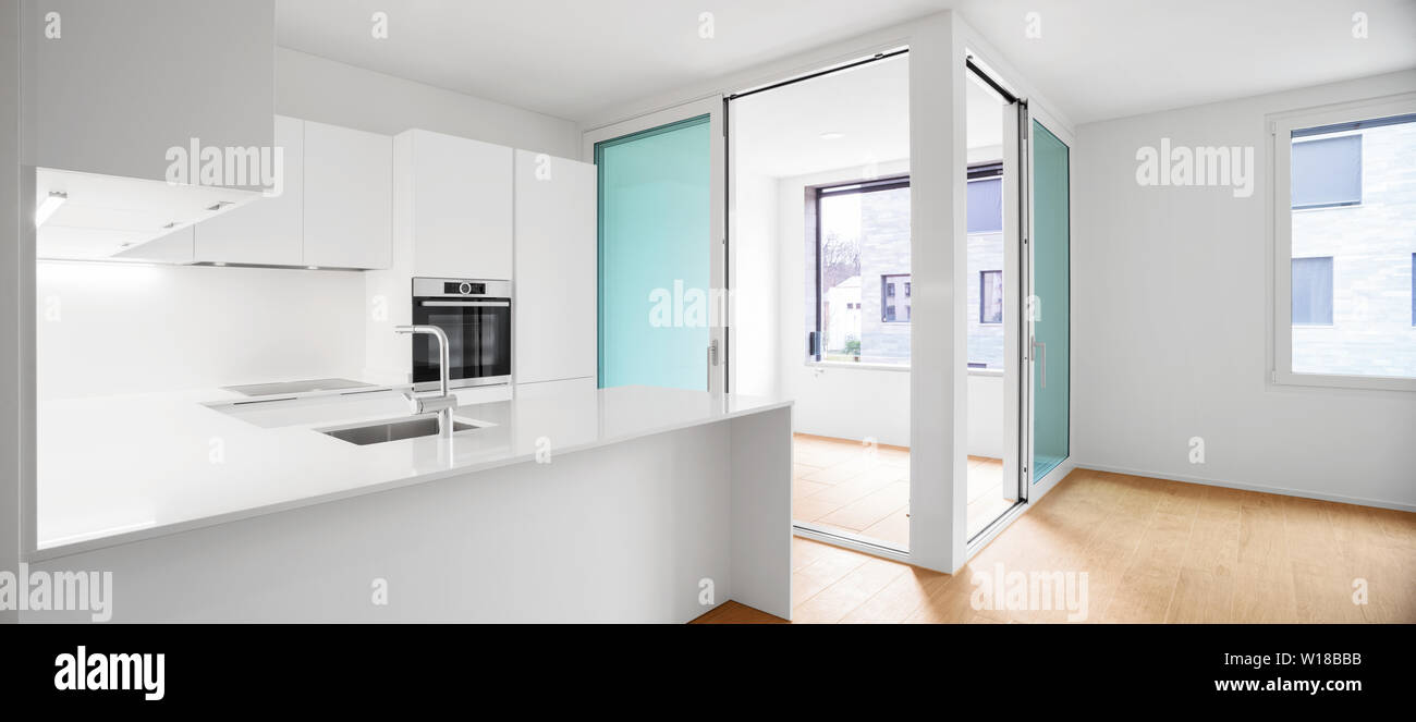 Interior of modern apartment with wooden floor Stock Photo - Alamy