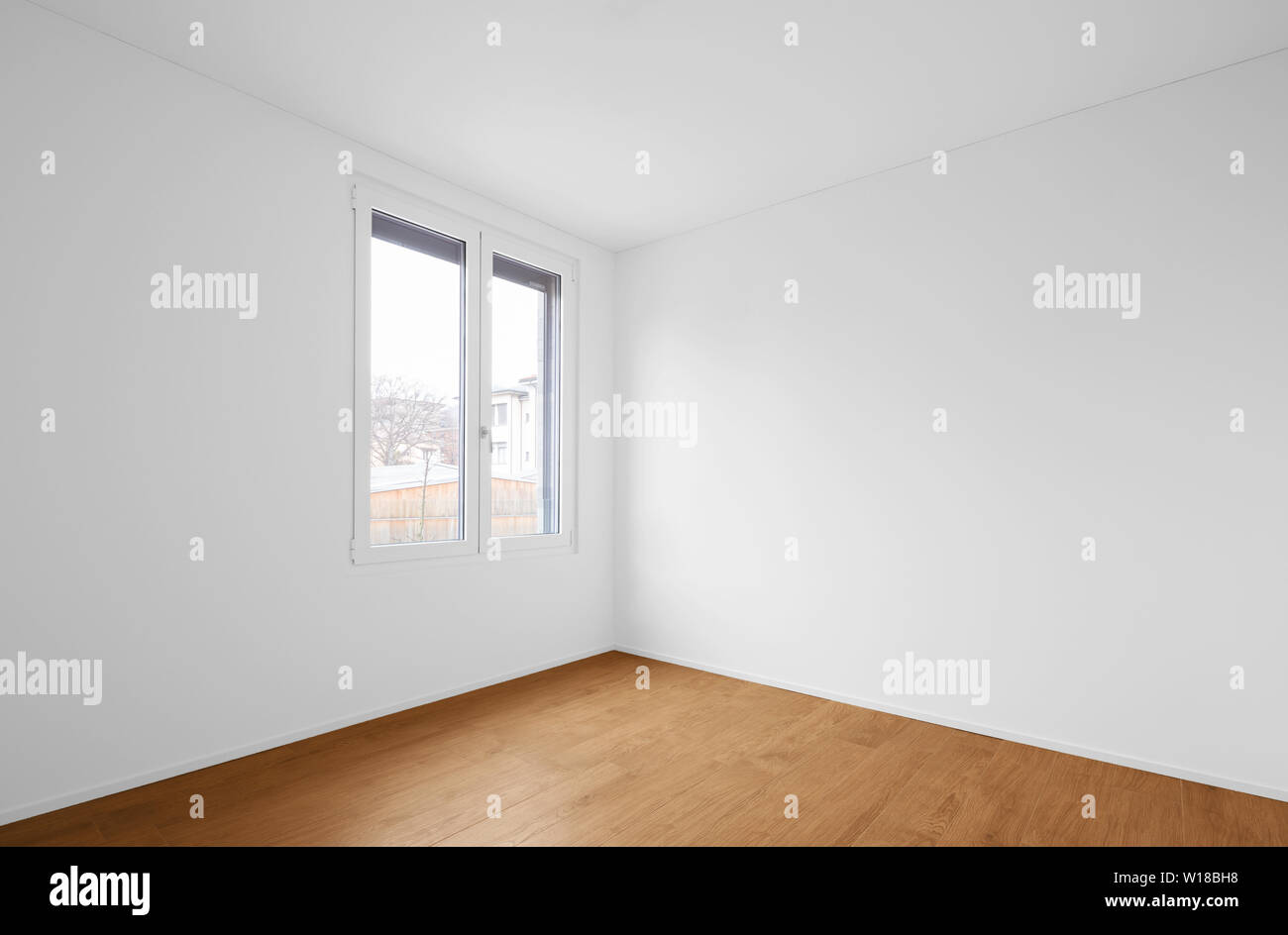 Interior of modern apartment with wooden floor Stock Photo - Alamy