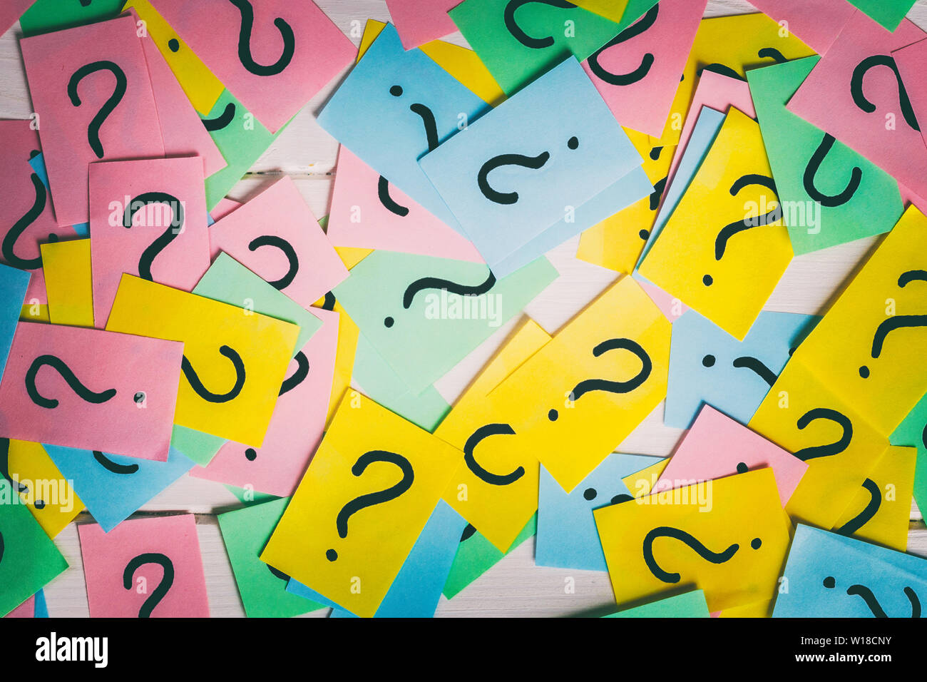 colorful paper notes with question marks. Closeup Stock Photo - Alamy