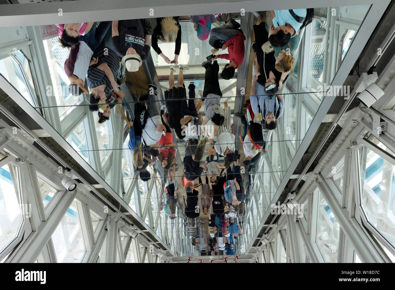 Reflection of people on a ceiling, Tower bridge, London Stock Photo