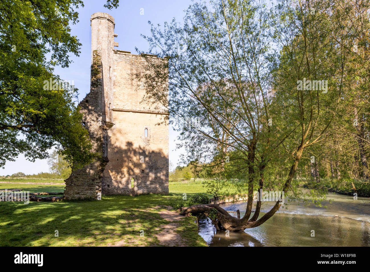Evening light on the ruins of Minster Lovell Hall, a 15th century manor house on the banks of the River Windrush, Minster Lovell, Oxfordshire UK Stock Photo