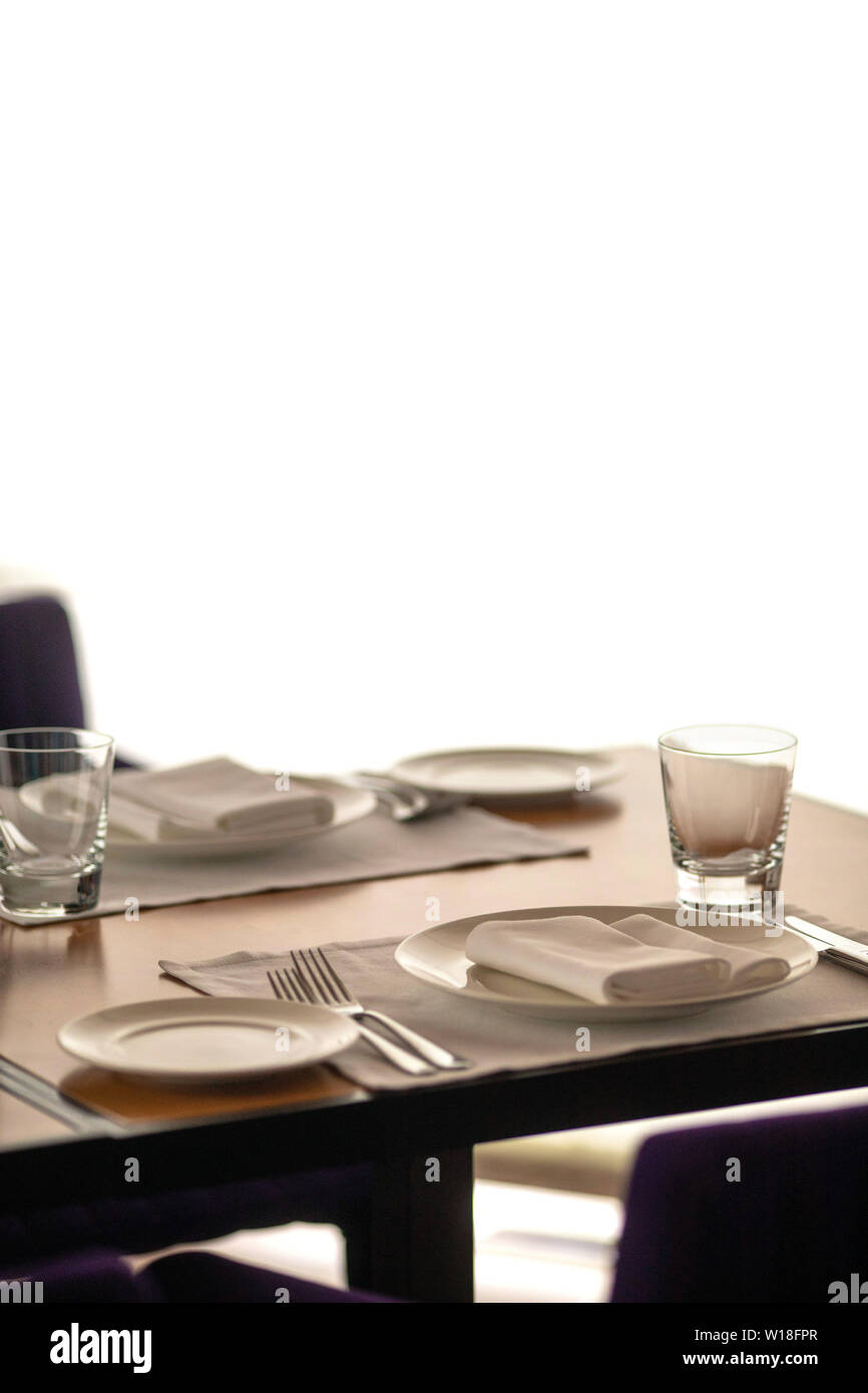 Chairs and table ready for serving meal Stock Photo