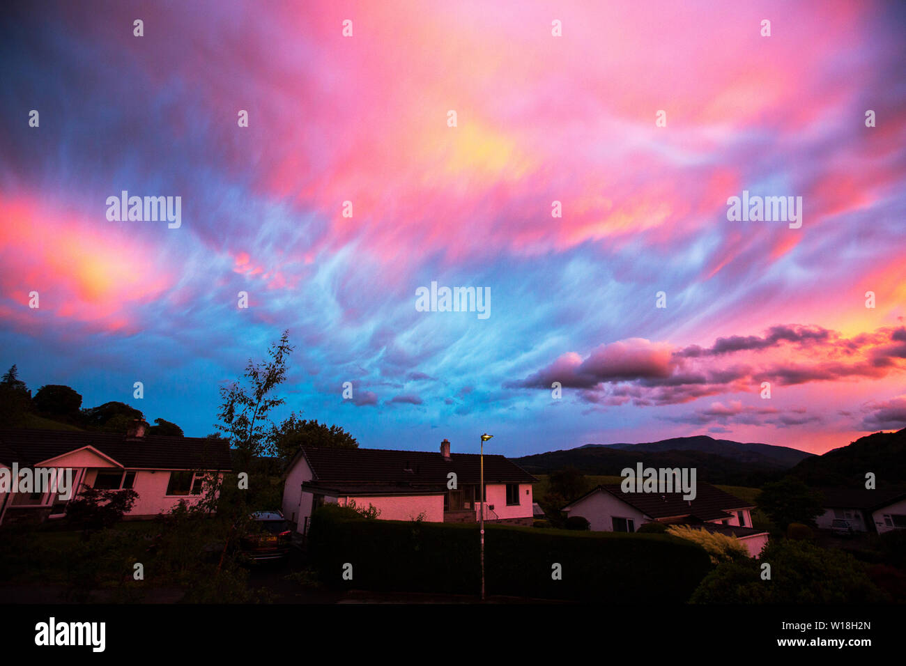 Clouds at sunset over Ambleside during stormy weather, Lake District, UK Stock Photo Alamy