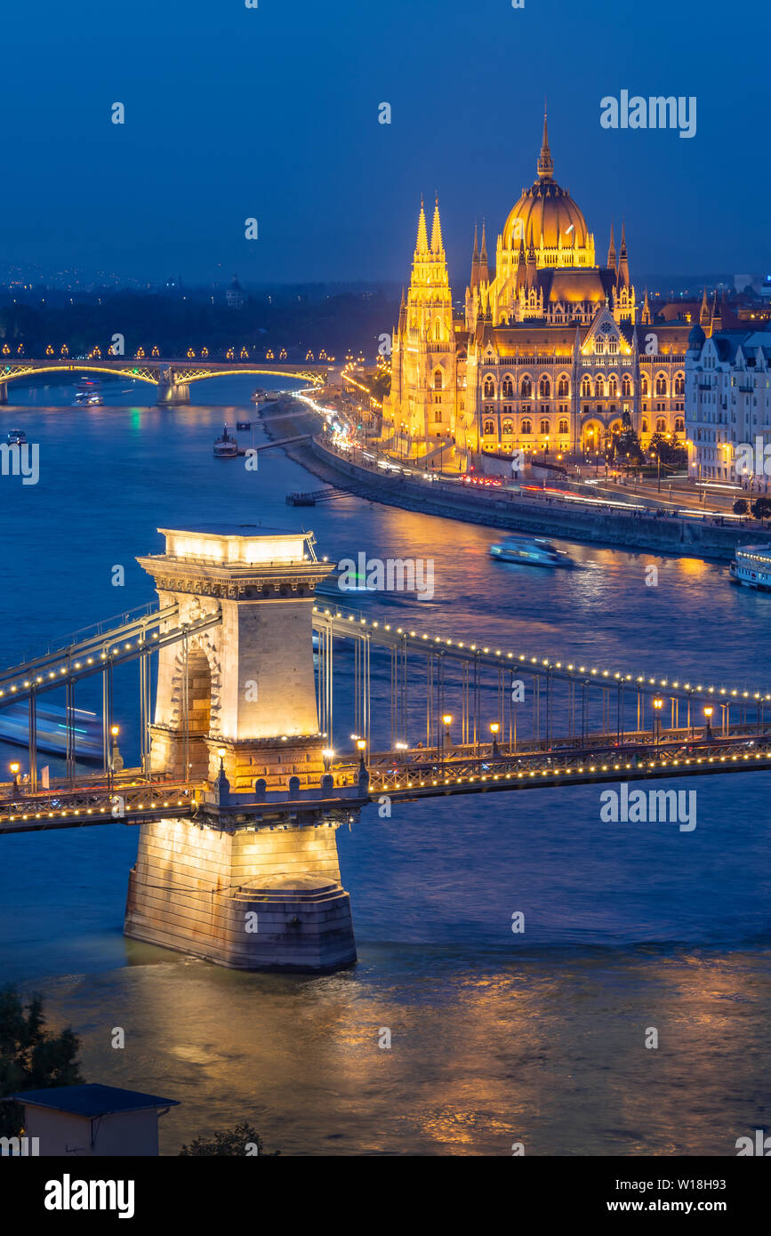 Aerial view of Budapest parliament and Chain bridge over Danube river at night, Hungary Stock Photo