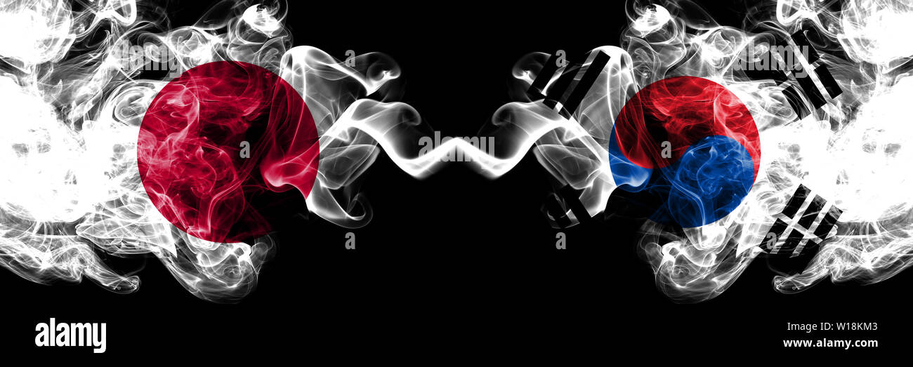 Japan Vs South Korea Korean Smoky Mystic Flags Placed Side By Side Thick Colored Silky Smokes Combination Of South Korea Korean And Japanese Flag Stock Photo Alamy
