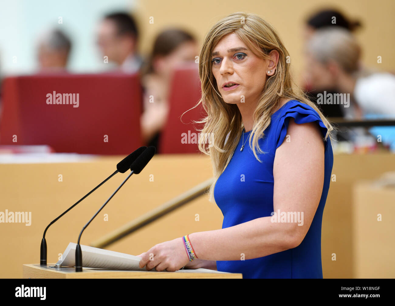 Munich, Germany. 26th June, 2019. Tessa Ganserer (Bündnis 90/Die Grünen) speaks at the plenary session of the Bavarian Parliament in the plenary hall. Ganserer is the first transident member of the Bavarian Parliament. Credit: Tobias Hase/dpa/Alamy Live News Stock Photo