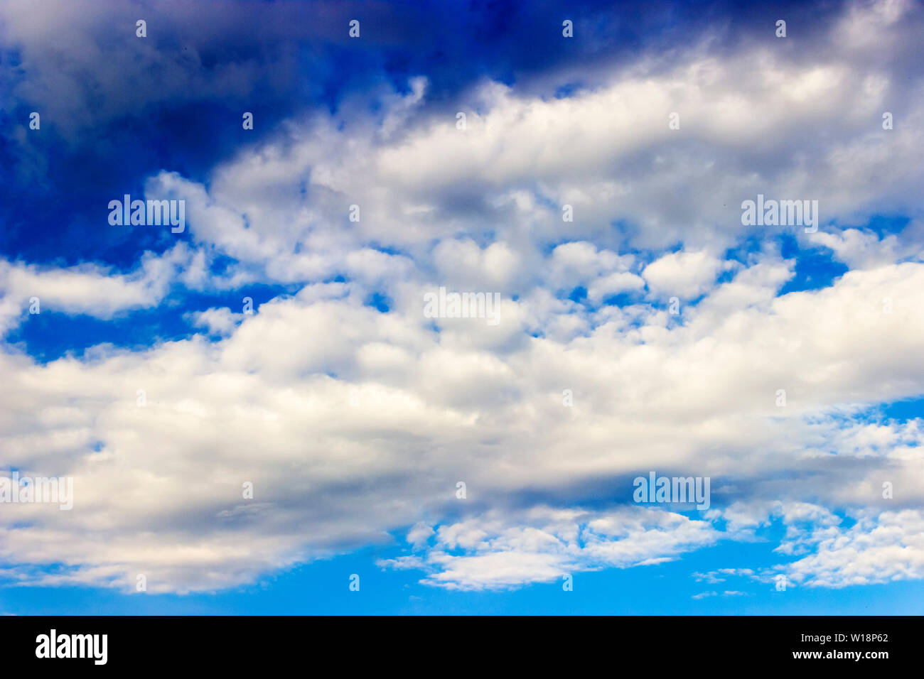 pictured in the photo Clouds and blue sky background with copy space ...
