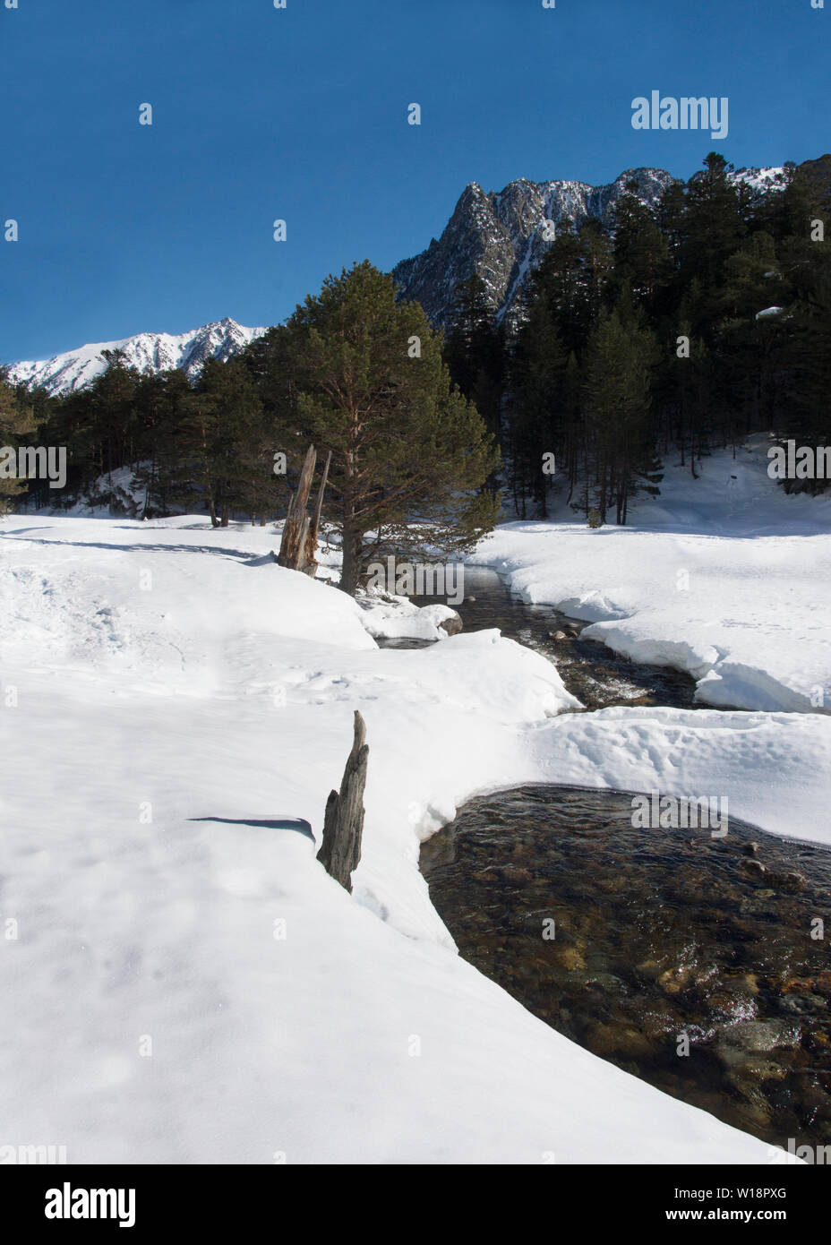 The Central Pyrenees at Pont Espagne. The valley of Marcadau (1620m)  under light snow cover.Access via Cauteret. Stock Photo