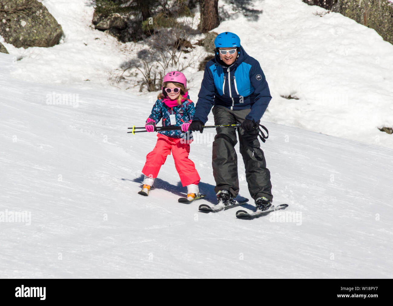 France. Pont Espagne. Father teaching his daughter to ski Stock Photo