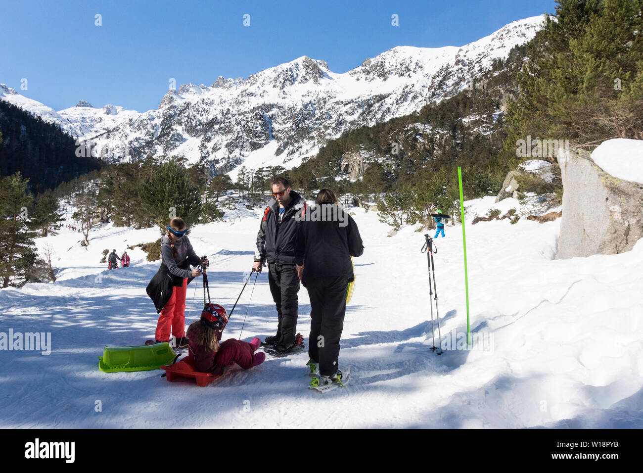 The central Pyrenees at Pont Espagne. A family enjoying the snow. Stock Photo