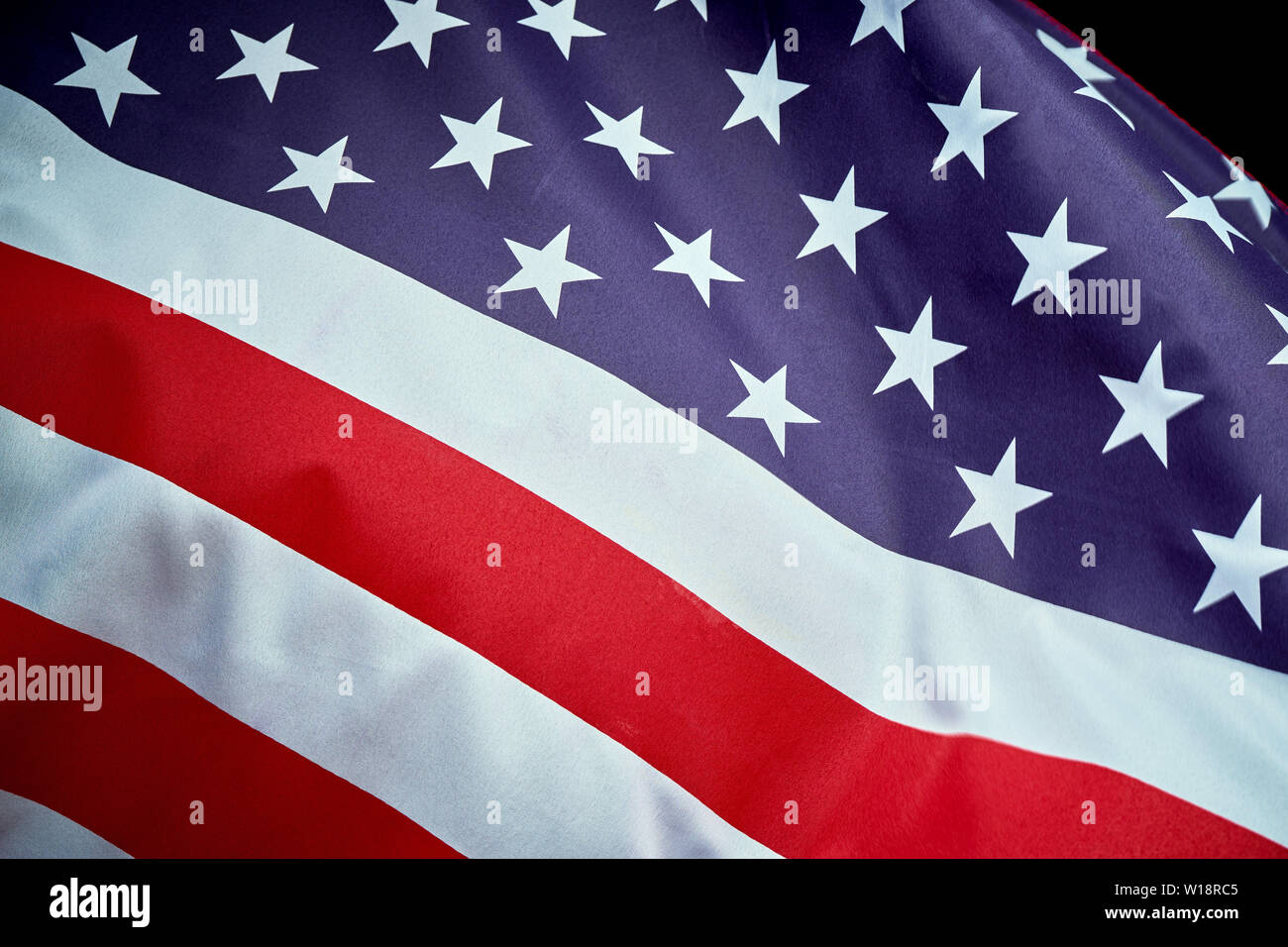 US flag waving in wind on Independence Day in America Stock Photo