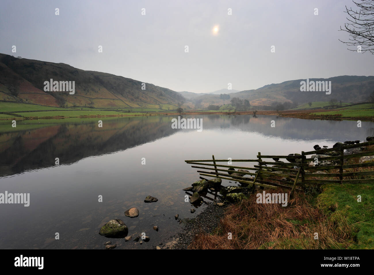 Misty view over Watendlath tarn, Keswick, Lake District National Park, Cumbria, England, UK Stock Photo