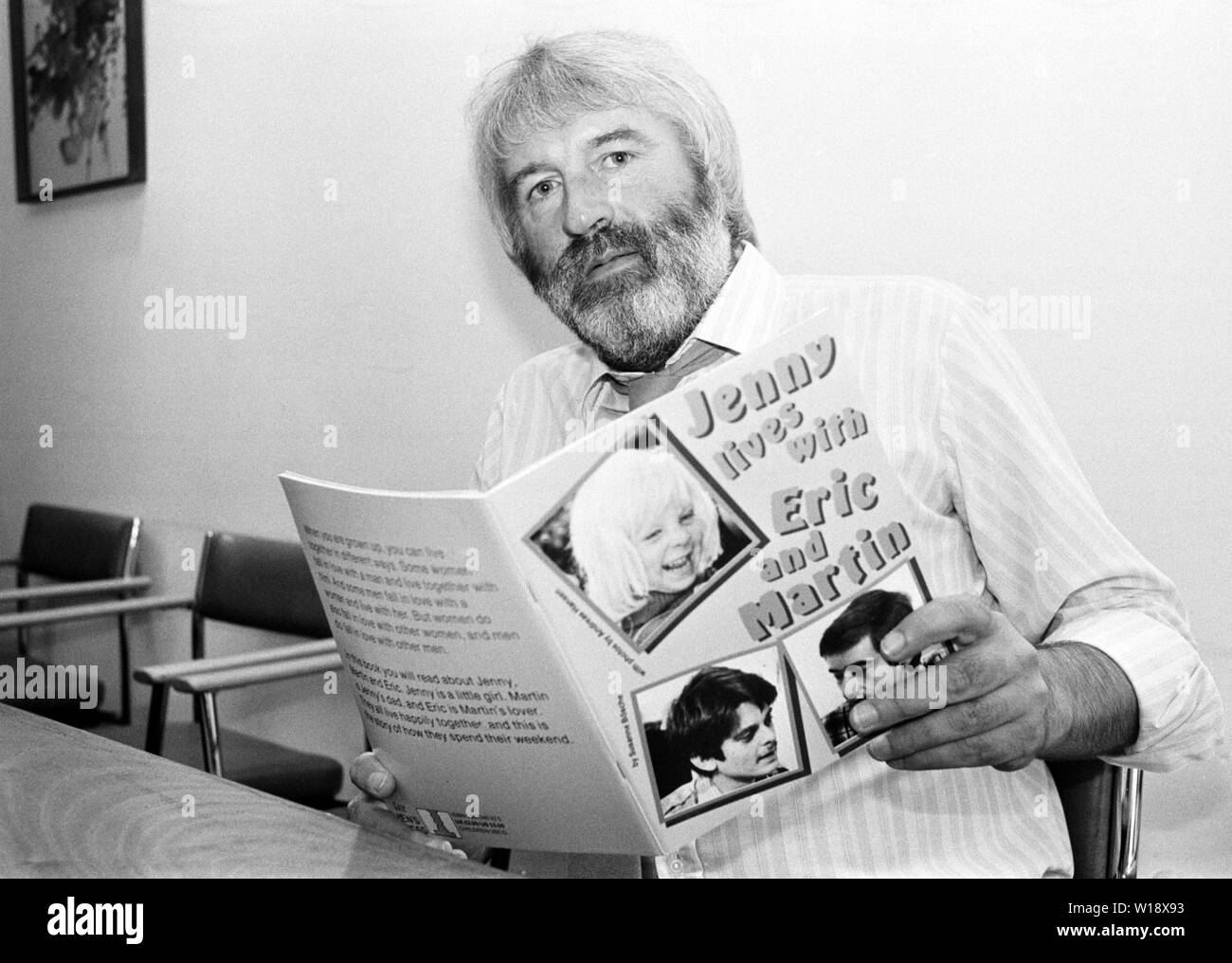 John Clarke, head of Harringay's Community Information at the borough's Central Library, with a copy of controversial schoolbook 'Jenny Lives with Eric and Martin' which parents have objected to. Stock Photo
